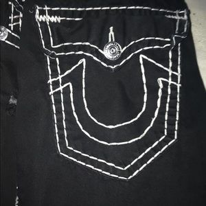 Black and white true religion jeans